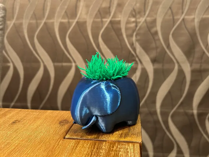 cute plant elephant with grass