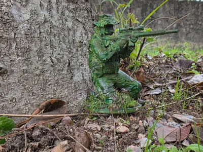 Crouching Military Figure