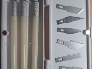 Folding box for craft knives,