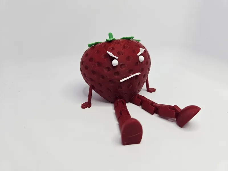 Angry strawberry table sitter
