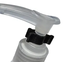Travel pump bottle safety clip