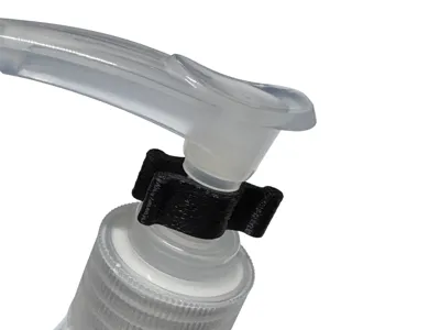 Travel pump bottle safety clip