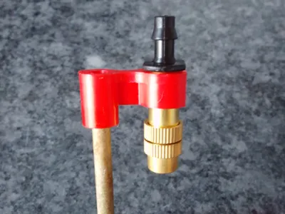 Holder for Water Spray Nozzle to use in pot plants