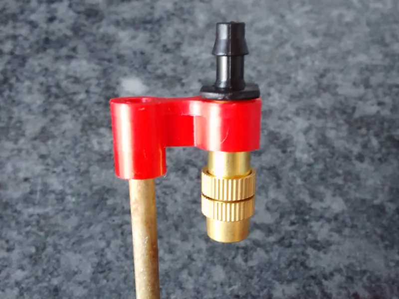 Holder for Water Spray Nozzle to use in pot plants
