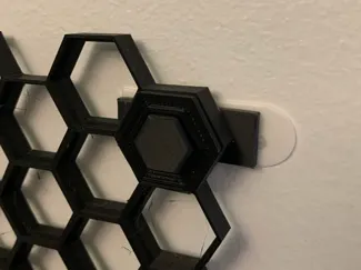 Command strip mount for honeycomb wall