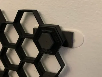 Command strip mount for honeycomb wall