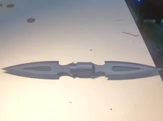 Double sided separable throwing knife