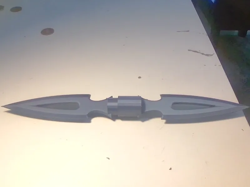 Double sided separable throwing knife