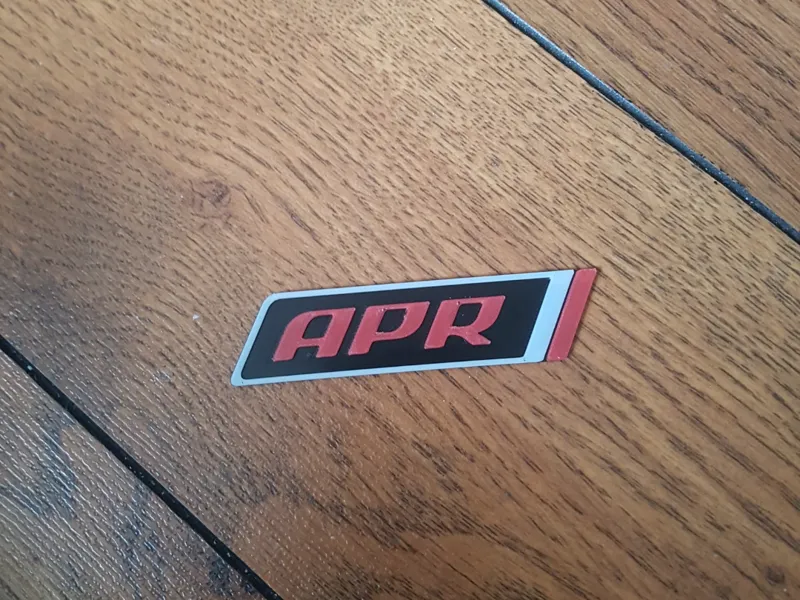 APR racing logo plaque 