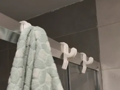 Shower cabin towel hanger
