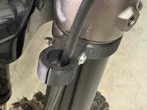 Surron Light Bee X front KKE fork brake hose clamp