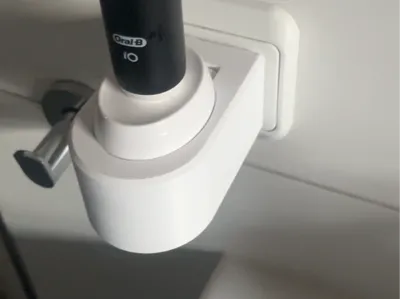 Electric toothbrush socket holder