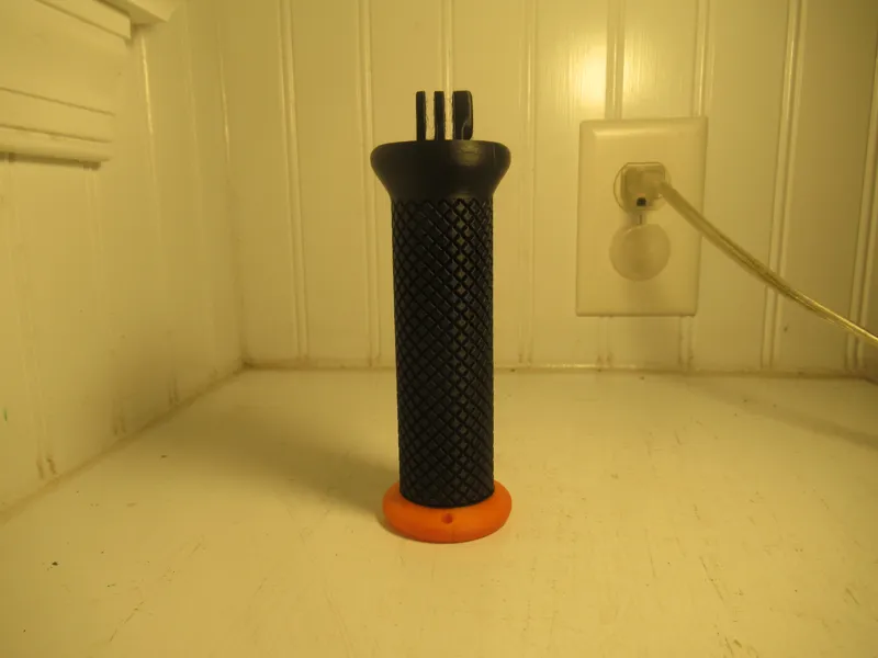 Floating action camera grip