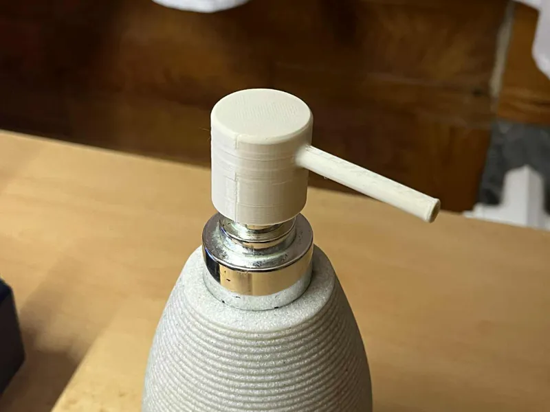 Head soap dispenser