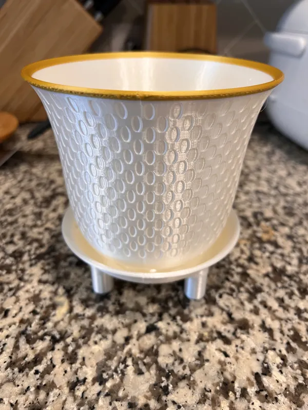 Decorative planter with drainage holes