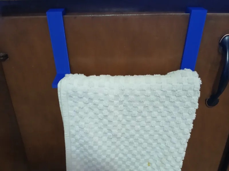 Kitchen cabinet door towel holder 