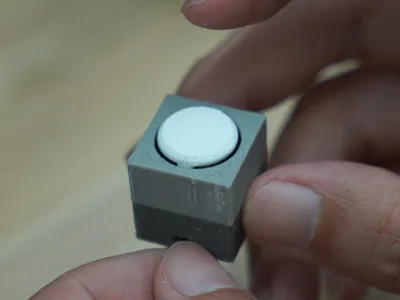Simple screwless button, using MX switches, can be used as a replacement for the Macinas power button