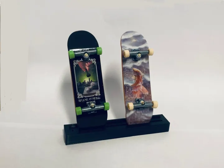 Finger skateboard holder