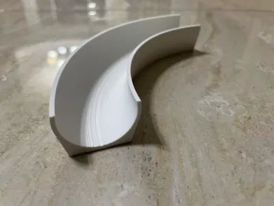 Washing machine drain hose guide