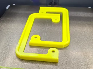 License plate frame backer