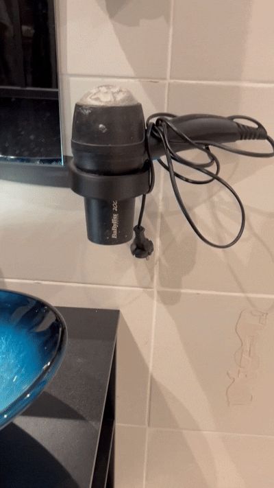 Support pour sèche cheveux