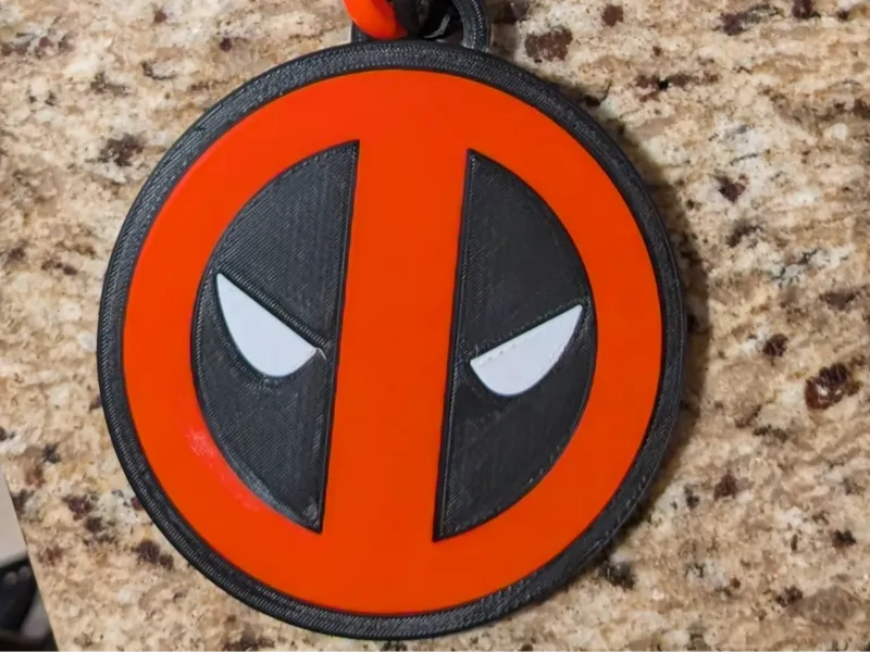 deadpool logo medallion