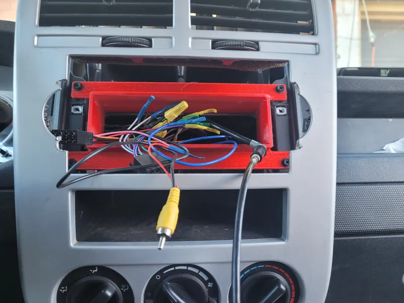08 Jeep Patriot single din radio stay insert