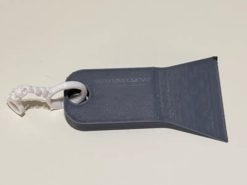 Bed scraper keychain