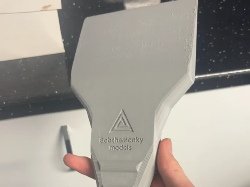 Ice scraper for ice covered car 