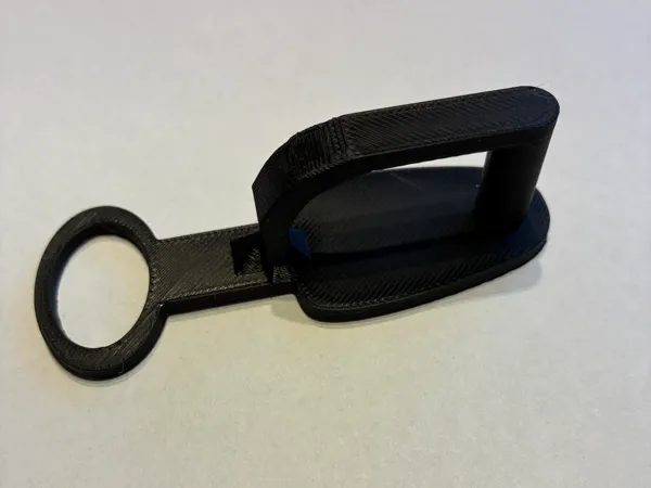Outil pour vitres Tesla