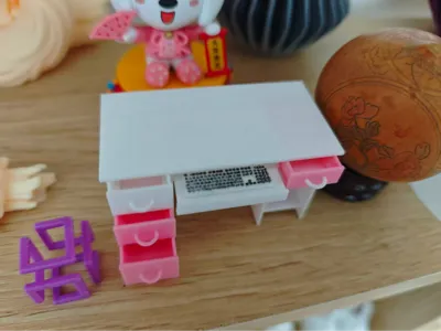 Miniature desk with miniature keyboard