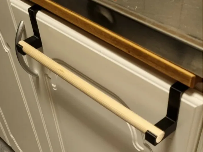 Kitchen towel cabinet hanger