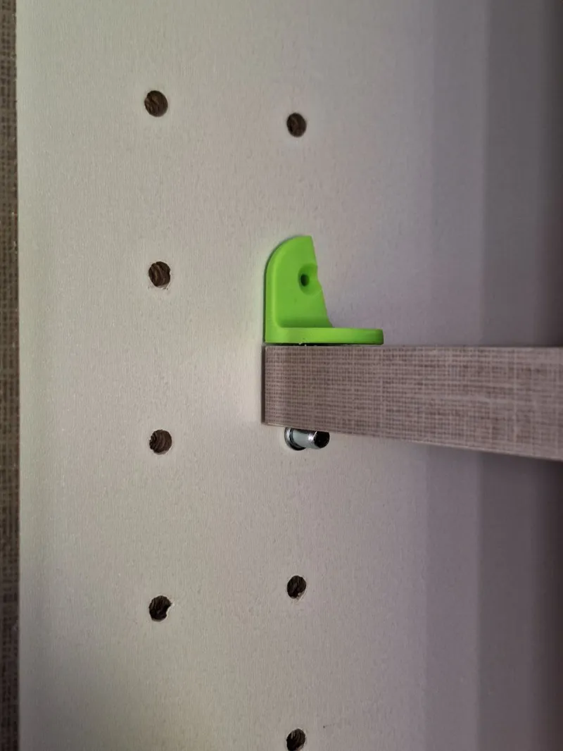 Shelf board retainer