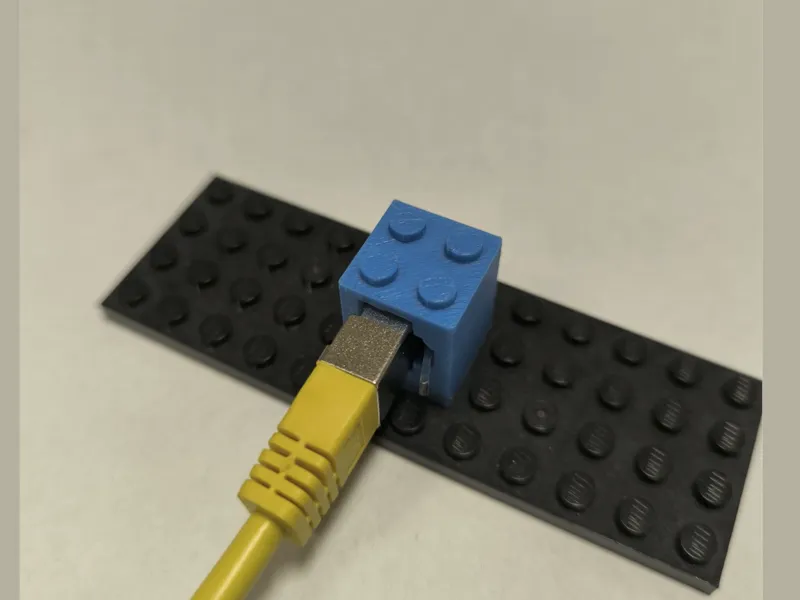 Building brick to Ethernet (RJ-45) adapter