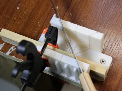 45 and 90-degree auxiliary cutting tool for wood strips