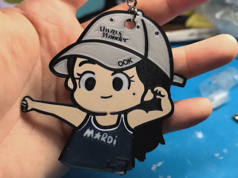 钥匙扣，邝玲玲(maybe?)