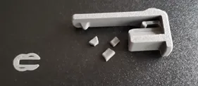 A white object on a black surface
AI-generated content may be incorrect.
