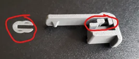 A white plastic piece with a red circle around it
AI-generated content may be incorrect.