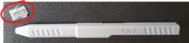 A white object on a black surface
AI-generated content may be incorrect.
