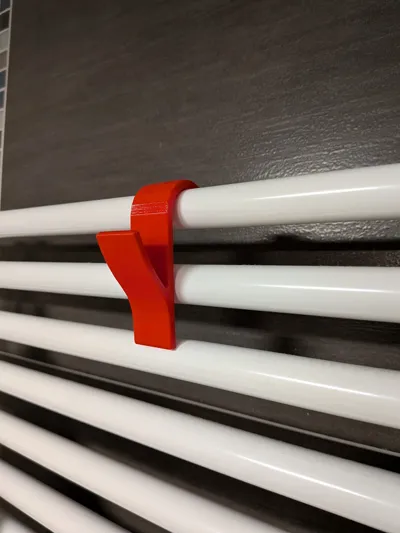 Towel holder for the towel radiator