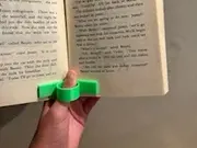 One handed book holder/reading aid