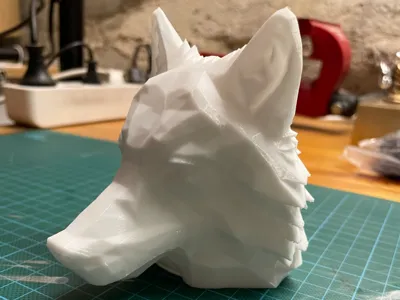 Wolf Low-Poly Art trailer hitch cover