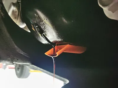 Oil stream back diverter