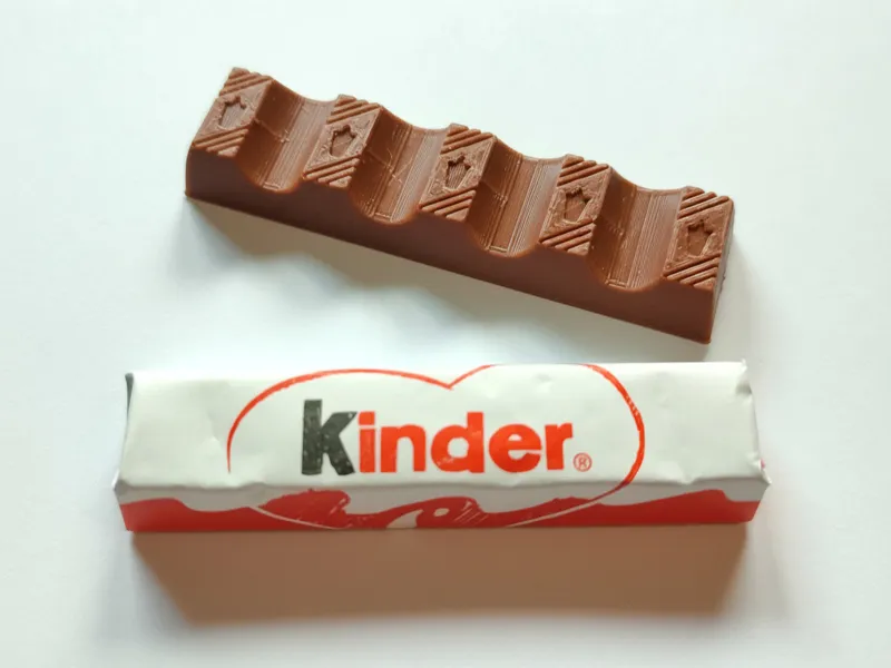 Kinder chocolate bar, keychain and fridge magnet