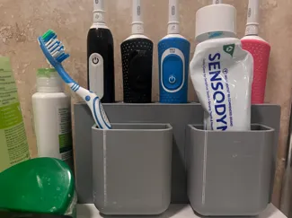 5 piece toothbrush with a slider easy clean tray
