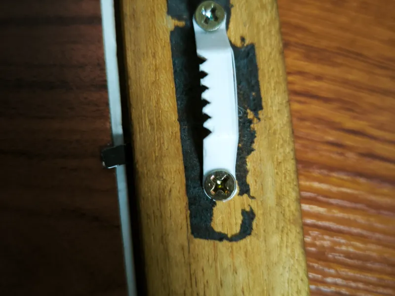 Pendurador serrilhado para quadros
