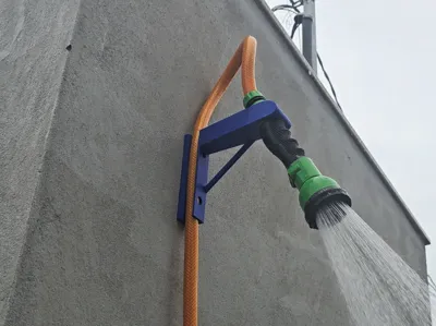 Mobile shower with hose holder