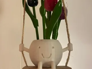 swinging flowerpot man
