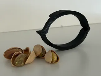 Pistachio Opener (cracker)