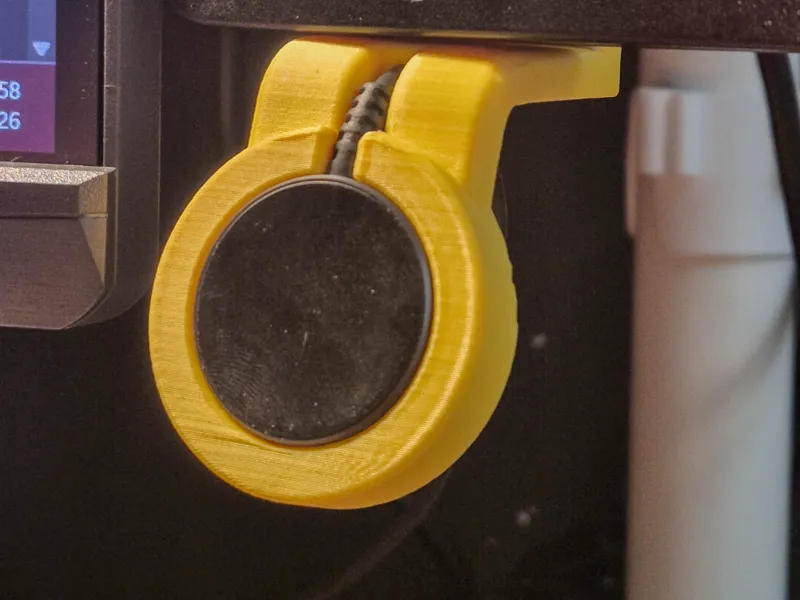 Galaxy Watch charger under monitor mount